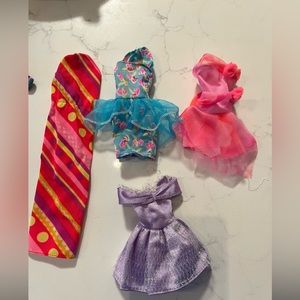Vintage assorted Barbie clothes